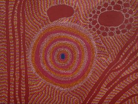 Aboriginal artwork that's earthy red with dots and swirls.