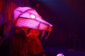 A large snake head worn by some actors with lights coming out of the eye. Gurril Storm Bird