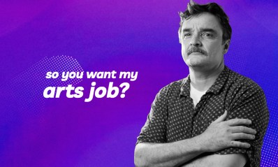 Against a purple backdrop, a man with dark hair and a moustache. 'So you want my arts job' is printed in white.