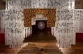 view of an art installation of a traditional chinese gate made from paper. NAS Gallery. Neighbour at the Gate.