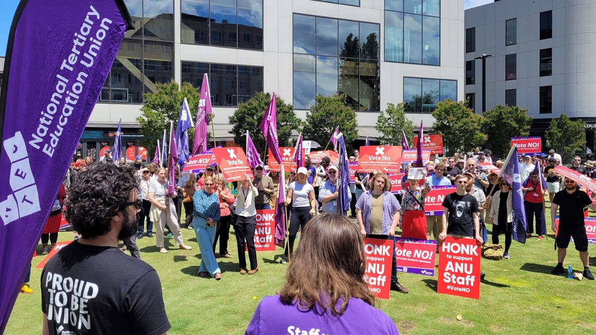 Protestors gather outside ANU.