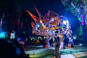 A triceratops made up of glass panels. It's lit up. Universal Kingdom: The Next Era.