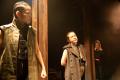 Three women dressed in beige colours in the production of Othello.