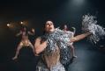 Four women in sparkly gold outfits dancing. Two have silver pom poms in a production of PHANTASM.