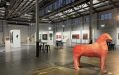 A big warehouse showcasing art, featuring a large sculptural work of what appears to be a four-legged animal. Free exhibitions Western Australia.