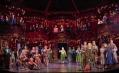 Large cast scene in La La Bohème.