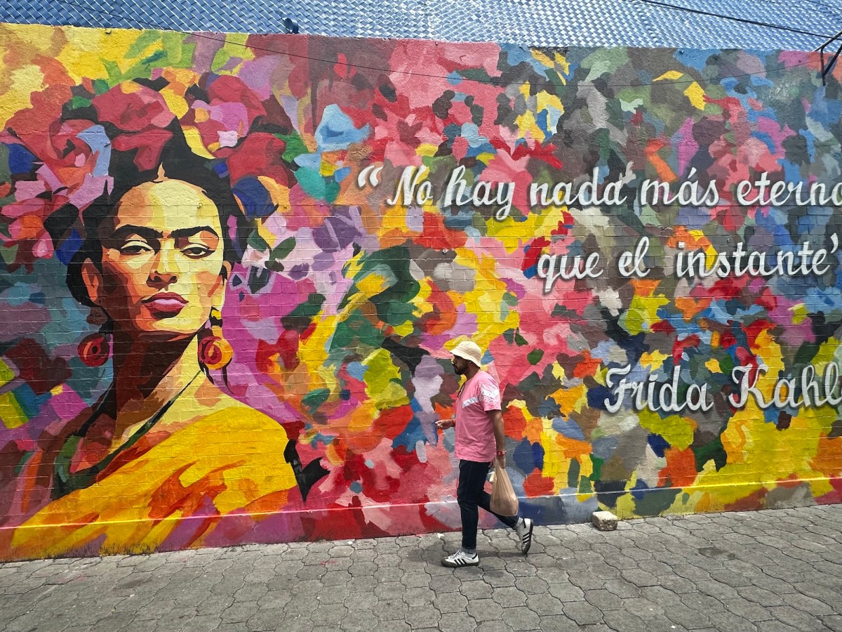colourful mural with picture of Frida Kahlo, Mexico City
