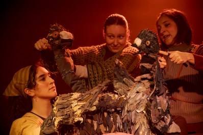 Three women manipulating two bird puppets in a production of Lost and Finding.