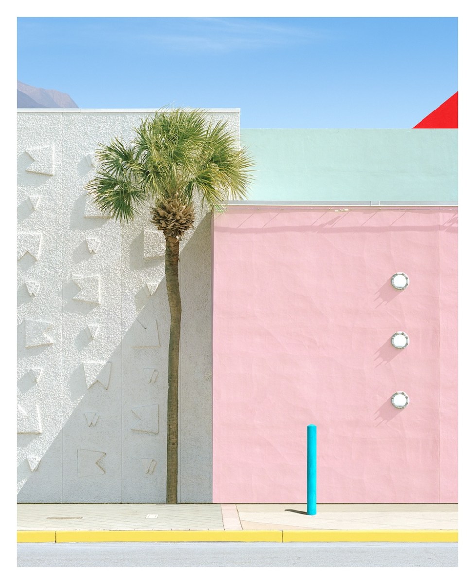 Photograph of a Miami street with pink building and palm tree. Photo Sydney
