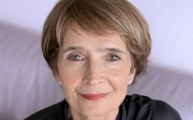 close up photo of a woman with short brown hair, Jana Wendt.