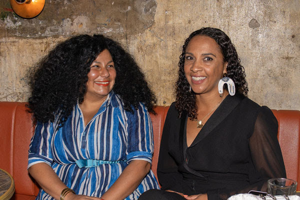 Outgoing MAV CEO Lauren Mullings (right) and Deputy Board Chair Neda Rahmani (left) at Al Otro Lado del Muno for ‘NEWPRINT 3’, March 2025. The photo depicts 