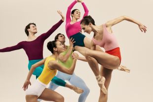 Elijah Trevitt, Larissa Kiyoto-Ward, Lilla Harvey, Isobelle Dashwood and Jett Ramsay in a promotional image for The Australian Ballet's 'Copland Dance Episodes', part of the company's 2026 season. A dynamic photograph of five ballet dancers in brightly coloured clothes, performing contemporary, lively choreography.