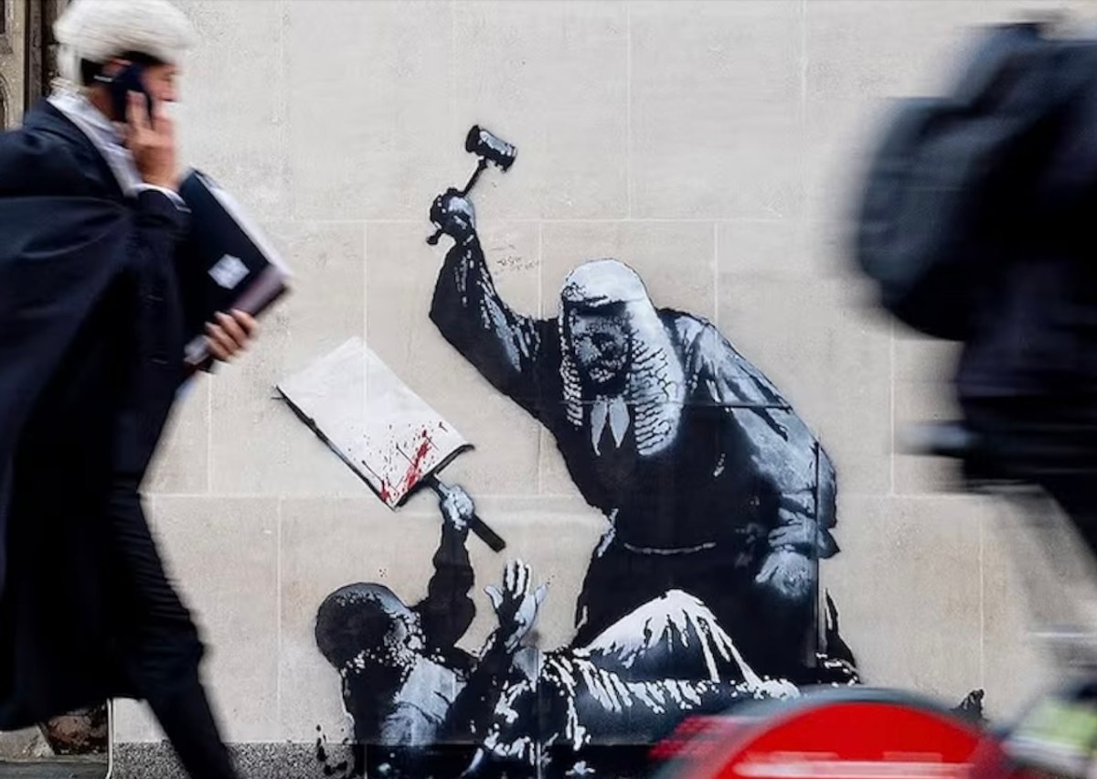 A new artwork by Banksy comments on censorship of protests.