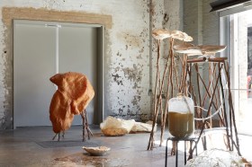 Gallery view of installation of sculptures made from various materials.