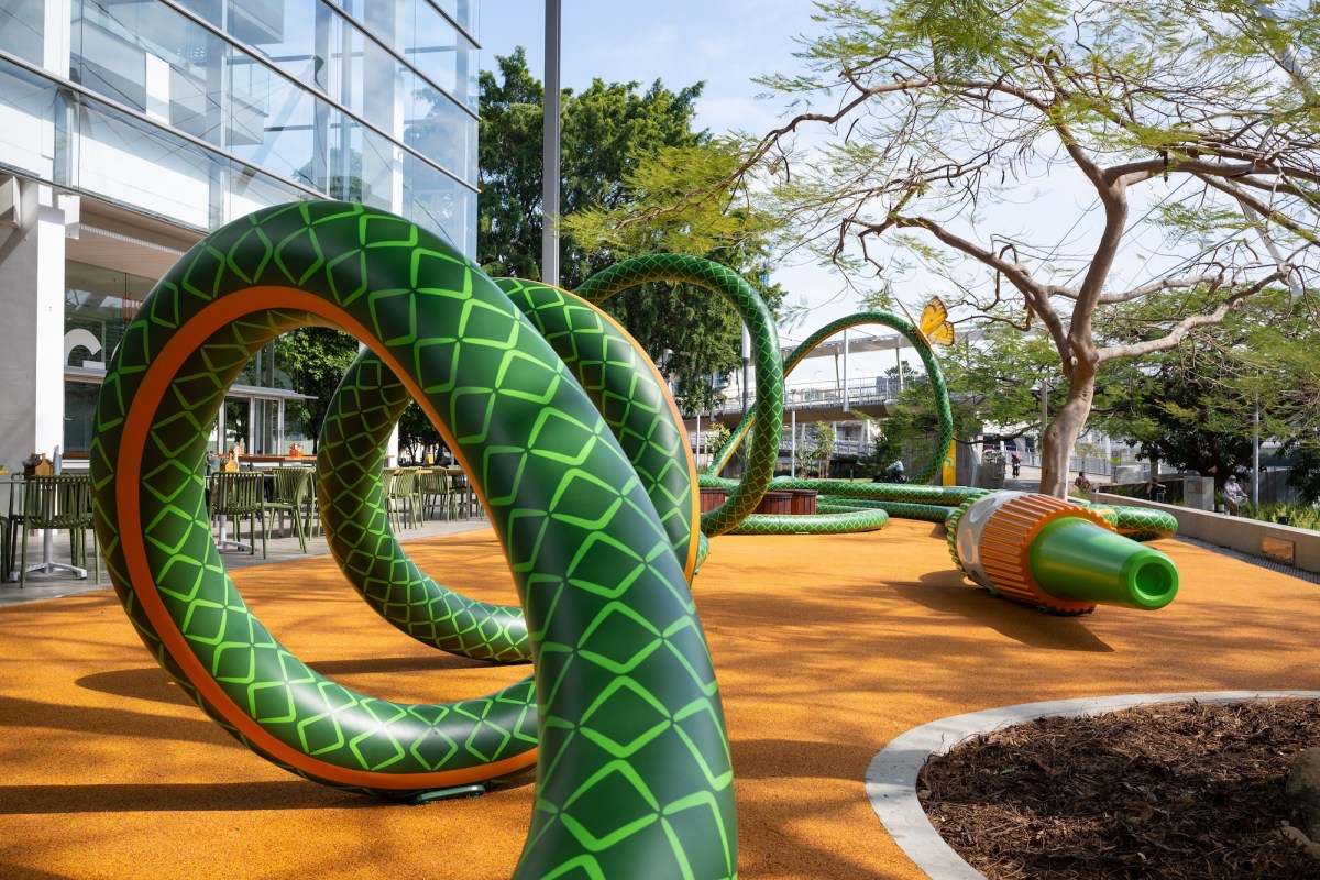 Sculpture of a green garden hole in park setting. QAGOMA
