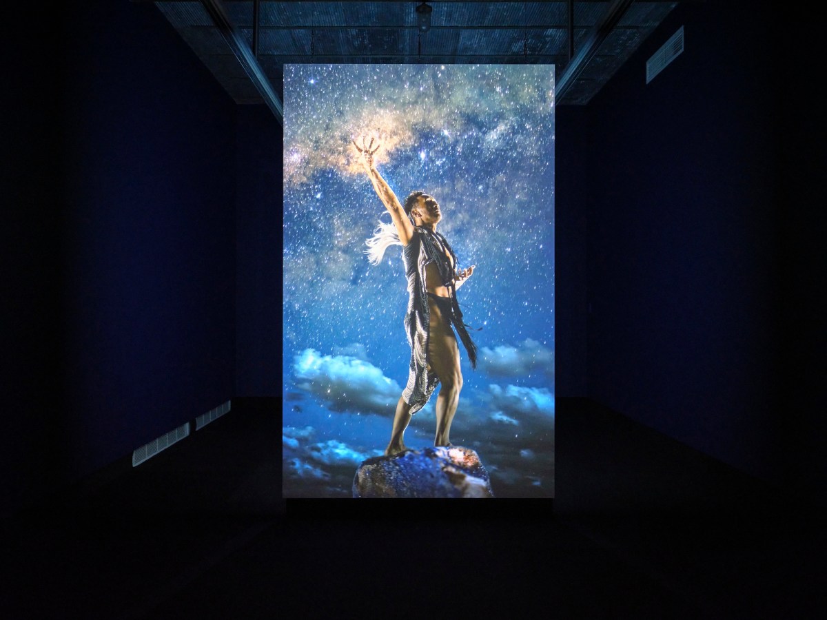 Video of a spiritual male figure floating in sky. Lisa Reihana