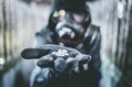 disguised robber with stolen diamonds in their hand. The Louvre heist