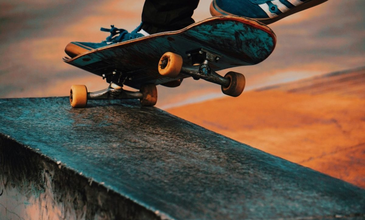 A dynamic photograph of a skateboarder mid-trick; the photo's focus is on the deck itself, as its rear wheels roll along the edge of an outdoor concrete staircase. The skateboarder's shoe-glad feet are visible at the top of the frame. The photograph illustrates ArtsHub's weekly wrap of Australian arts sector appointments.
