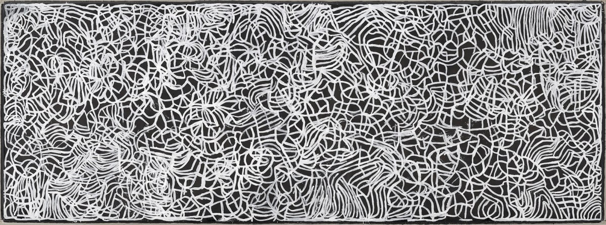 Aboriginal painting in black and white with swirling white lines on black background