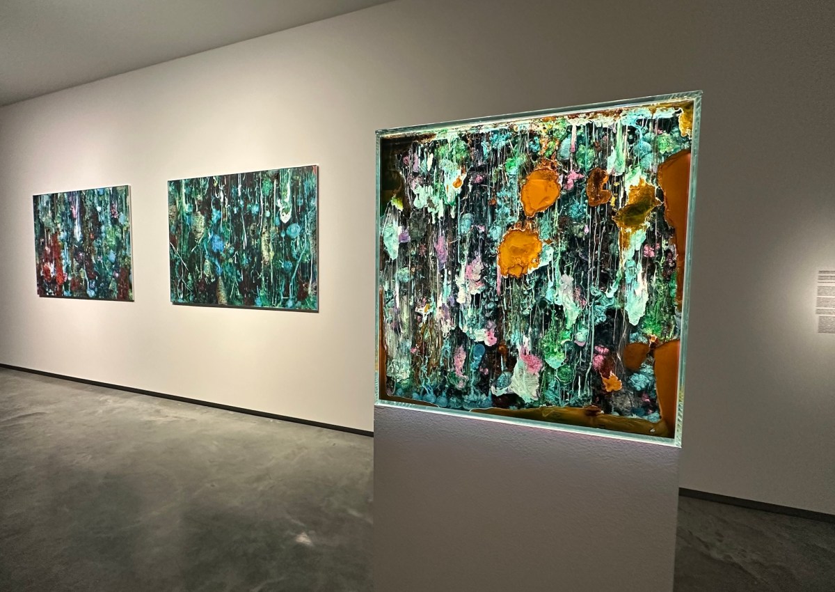 colourful abstract forms in both freestanding sculpture and paintings behind. Data Dreams AI