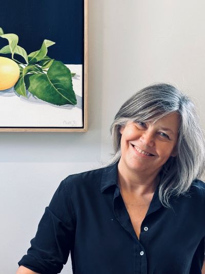 Helpmann Award-winning director Marion Potts has joined the Carriageworks Board. The photo depicts a middle-aged woman with grey and black hair with her head tilted to the left. She is smiling at the camera. art sector appointments