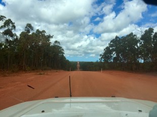 Image of long red earth road in outback Australia. Artback NT