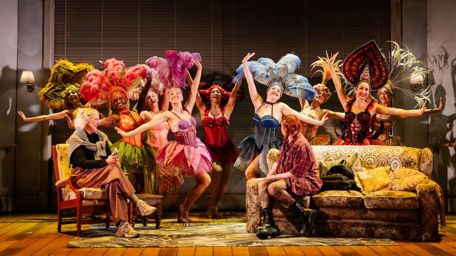 The elderly Kitty's memories come to life in 'Tivoli Lovely', Eddie Perfect's new Australian musical for WAAPA. The 'Tivoli Lovelies' - showgirls on the Tivoli touring circuit - sing and show off their feathered headdresses and bright costumes as the elderly Kitty and 15-year-old Charlotte watch on.