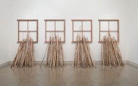 Rosalie Gascoigne, Takeover Bid, 1981, found window frames and thistle stems, 200 x 350 x 60 cm (variable), Heide Museum of Modern Art, Melbourne. Donated through the Australian Government's Cultural Gifts Program by the Gascoigne family, 2016. © Rosalie Gascoigne/Licensed by Copyright Agency, Australia.