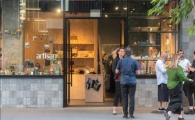 exterior of a craft and design gallery with people outside. artisan