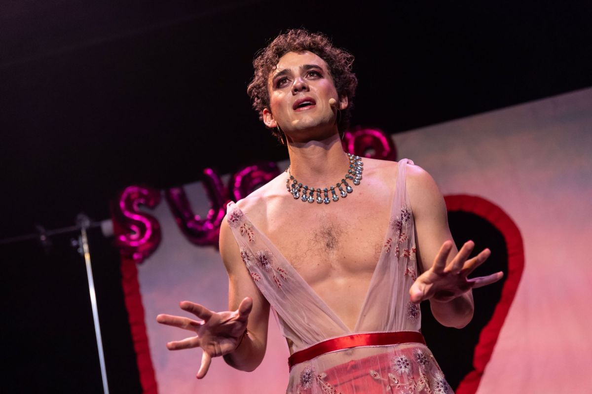 Tomáš Kantor, a curly-haired 20-something person dressed in non-traditionally gendered clothing, in the 2026 Midsumma production Sugar at Arts Centre Melbourne.