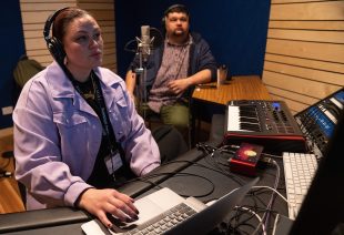 First Nations artist Jono (Eskatology) Stier works with mentor Candice Lorrae during the Space to Create event at the ANU School of Music in Canberrra.