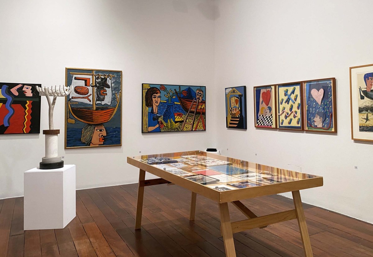 Objet D'Art - Theo Koning and his Creative Self: a photo of a gallery space showing various colourful paintings by artist Theo Koning.