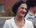 Woman with Lebanese heritage with dark hair and cream suit. Vale Dame Marie Bashir