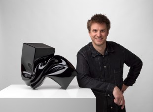 Liam Fleming with his Loewe Craft Prize finalist work, Patterns of Pressure, 2025. Photo: Grant Hancock.