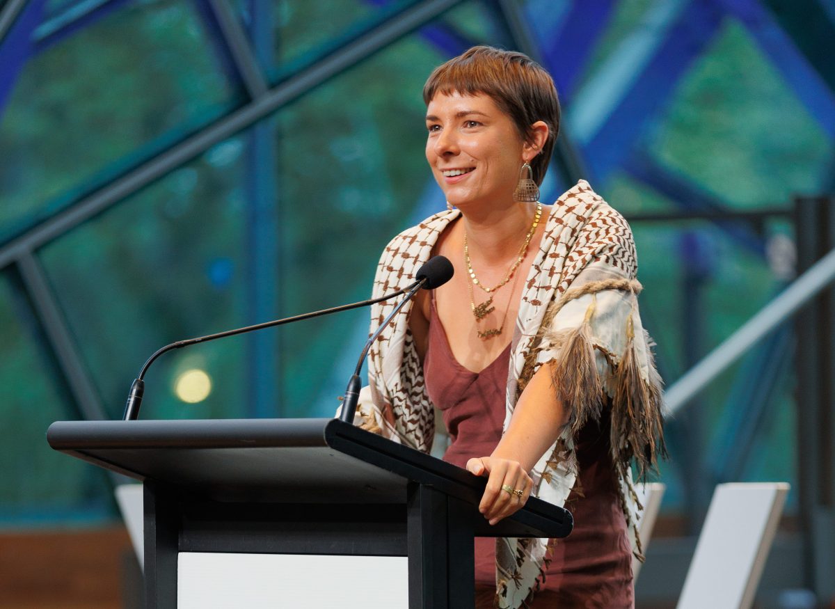 Evelyn Araluen accepts the 2026 Victorian Prize for Literature. Photo: James Henry / The Wheeler Centre.