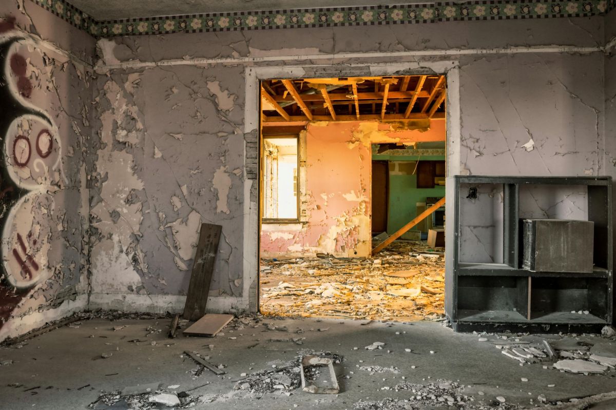 A ruinous building falling into disrepar and decay. defunded arts organisations