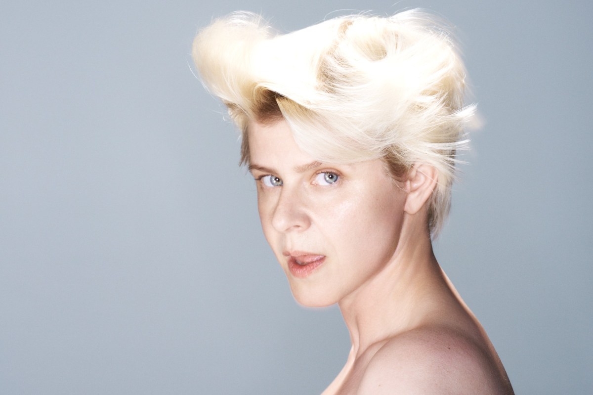 On Sexistential, Swedish pop singer Robyn embraces her body, emotions and sexuality while remaining unmistakeably herself. A photo of the pop singer Robyn, a fair-skinned woman with a shock of bleached blonde hair. She is photographed in profile but her blue eyes stare provocatively at the camera.