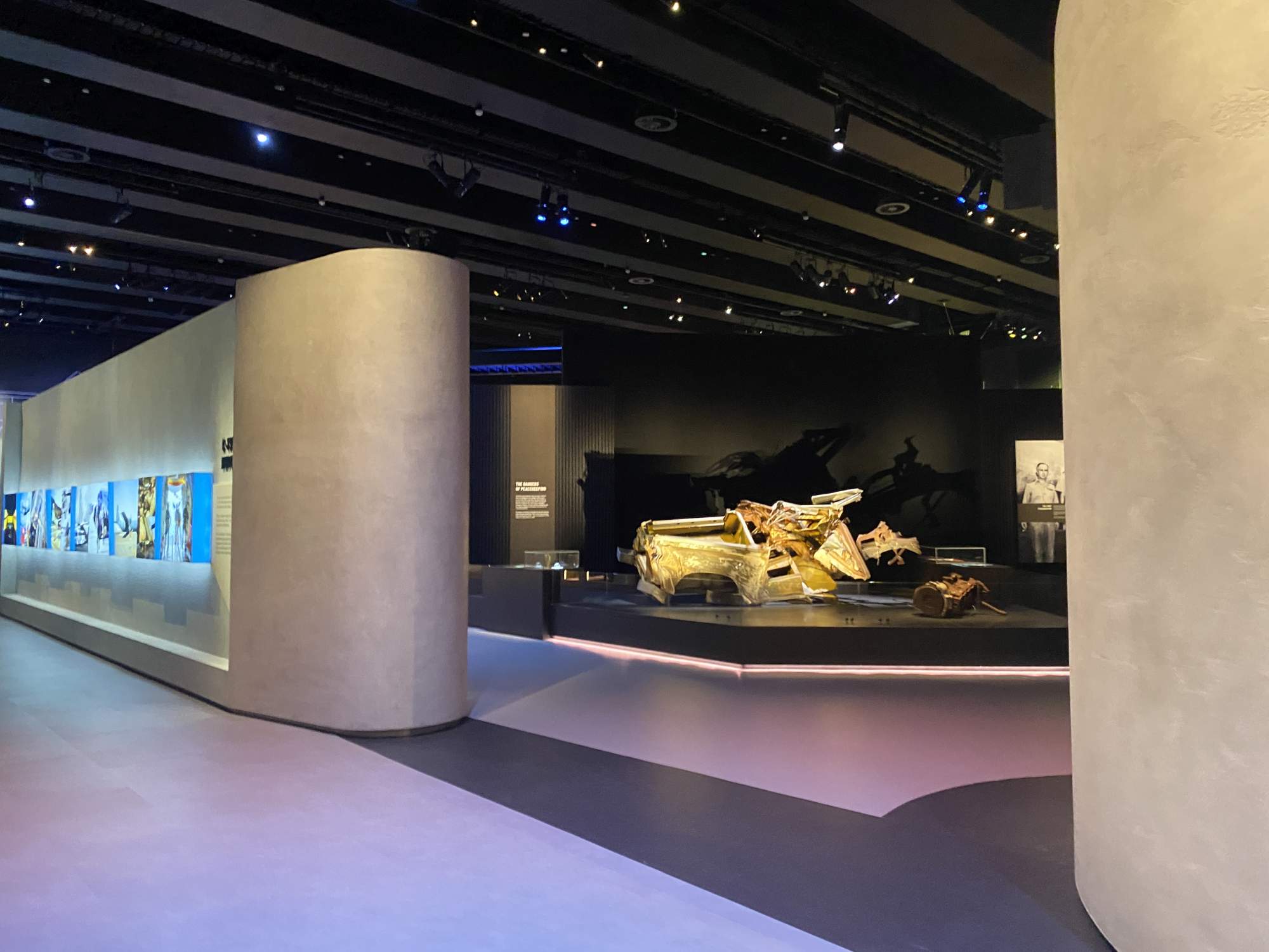 Entrance view into the new Peacekeeping gallery in Anzac Hall showing an Australian peacekeeping vehicle that was destroyed in Cyprus in 1974 killing Australian policeman (peacekeeper) Senior Sergeant Ian Ward and passenger Abdullah Omer. Photo: ArtsHub.