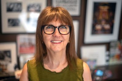 Susan Provan will step down as Festival Director and CEO of Melbourne International Comedy Festival later this year. An older woman with fair skin, shoulder length brown hair and dark-framed glasses smiles at the camera. arts sector appointments