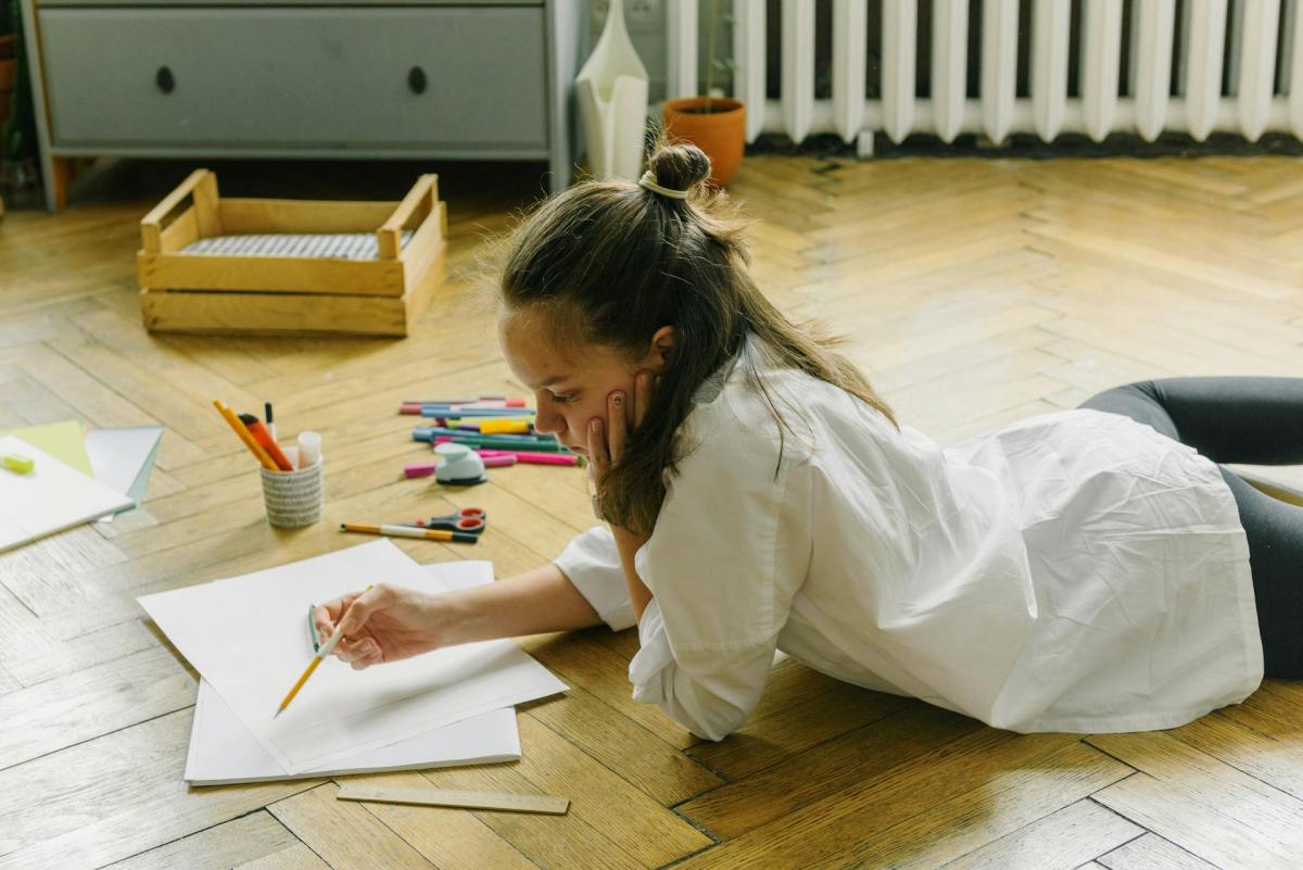 Photo: Ksenia Chernaya / Pexels. A child drawing.