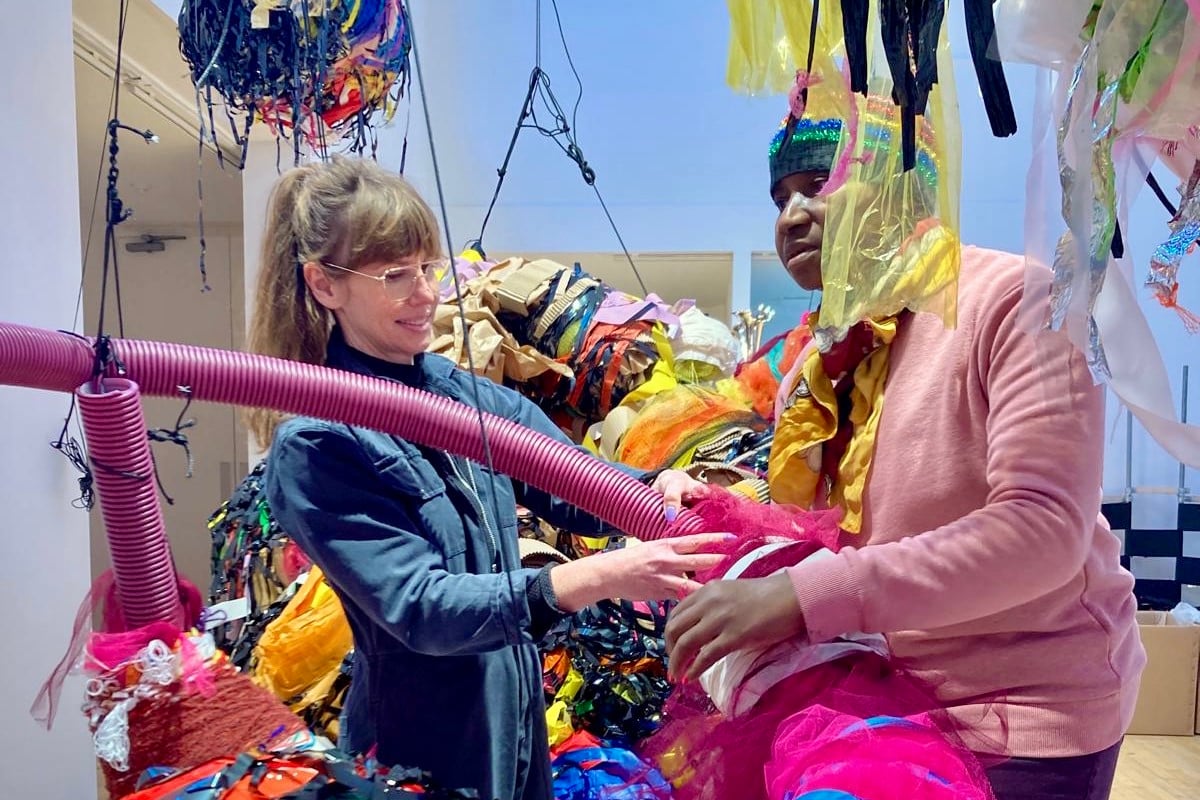 Nnena Khalu (right) at work on her installation. Photo: Lisa Slominski.