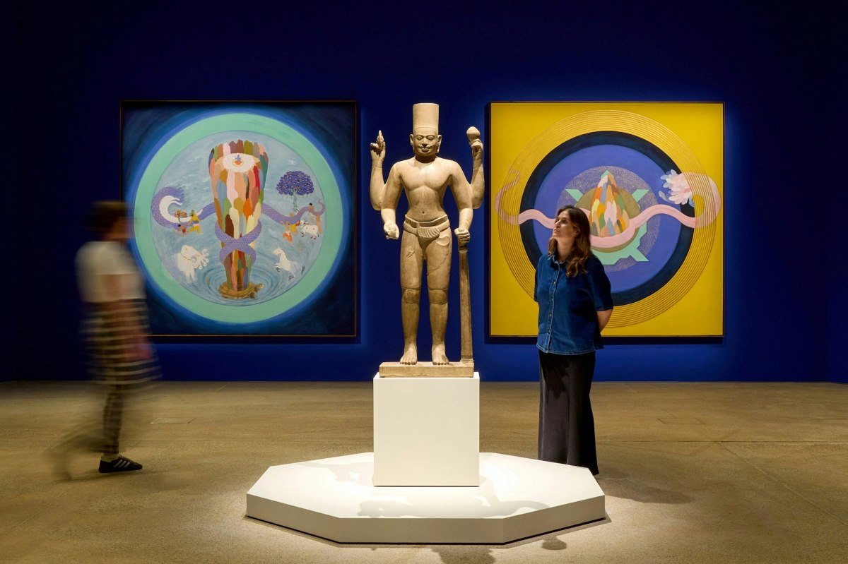 Installation view of the Avatar: Forms of Vishnu exhibition at the Art Gallery of New South Wales, featuring works by Desmond Lazaro and Cambodian Vishnu statue from the early 800s, photo © Art Gallery of New South Wales, Jenni Carter.