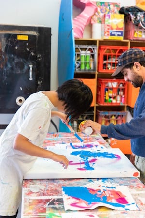 Artist Joanne Lee at work at co-art Studio. Photo: Supplied.