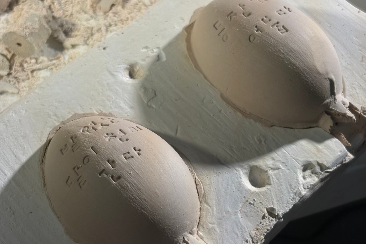 EJ Son, Stone Bread, 2026. A series of stone breads made from coffee grounds, salt, sand and flour, each containing a mystery note or an object for HEAP. Courtesy: the artist and Festival of Dangerous Ideas.
