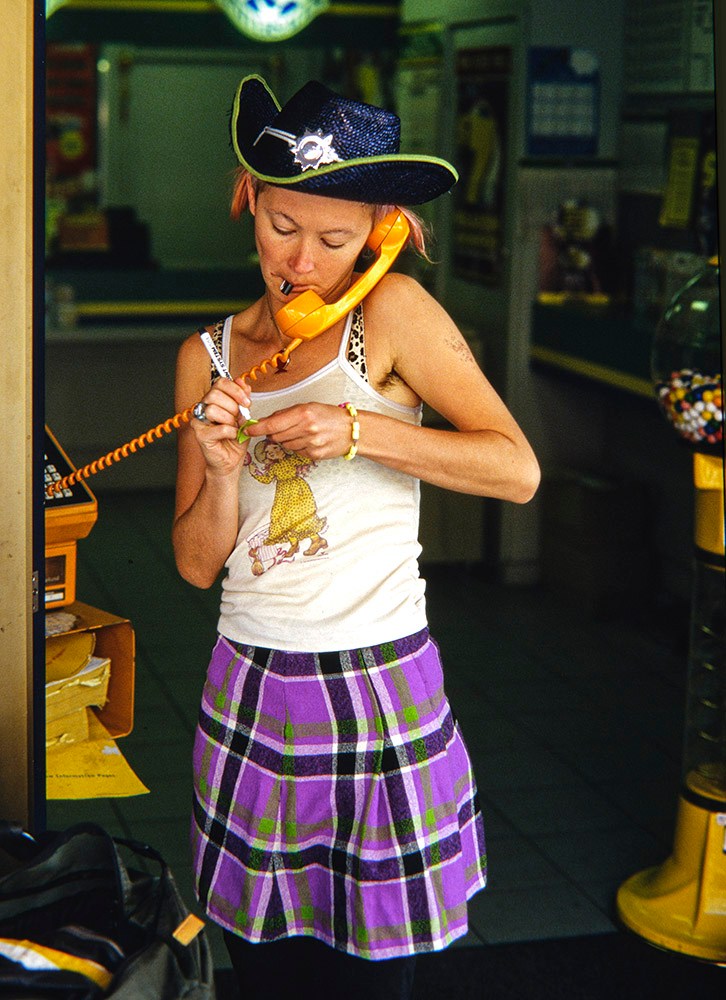Andrew Chapman, Girl at a phone booth on Russell Street, 1990s. Colour transparency, City of Melbourne Art and Heritage Collection. Courtesy: Andrew Chapman Photography.