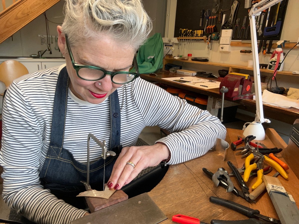 Gina Fairley in her jewellery studio. Photo: Supplied.