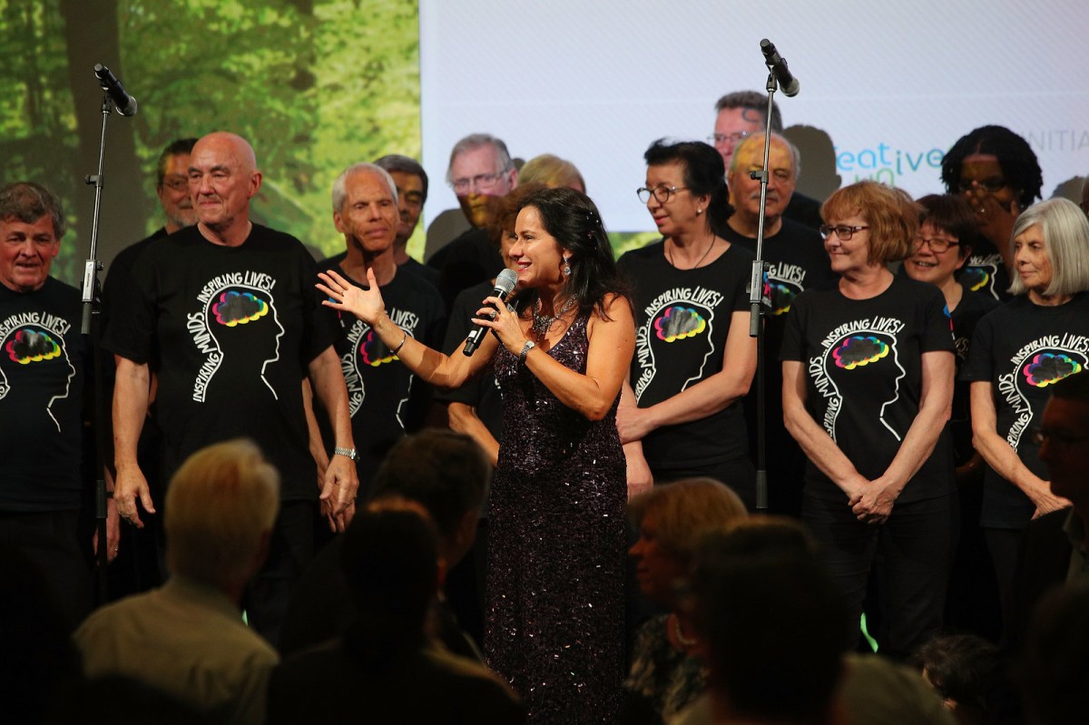 Tania de Jong and the With One Voice choir. Photo: Supplied. Performing arts in australia