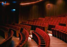 Arts Centre Melbourne second workers strike September 2026. A photo of an empty theatre seating bank showing red theatre seats.