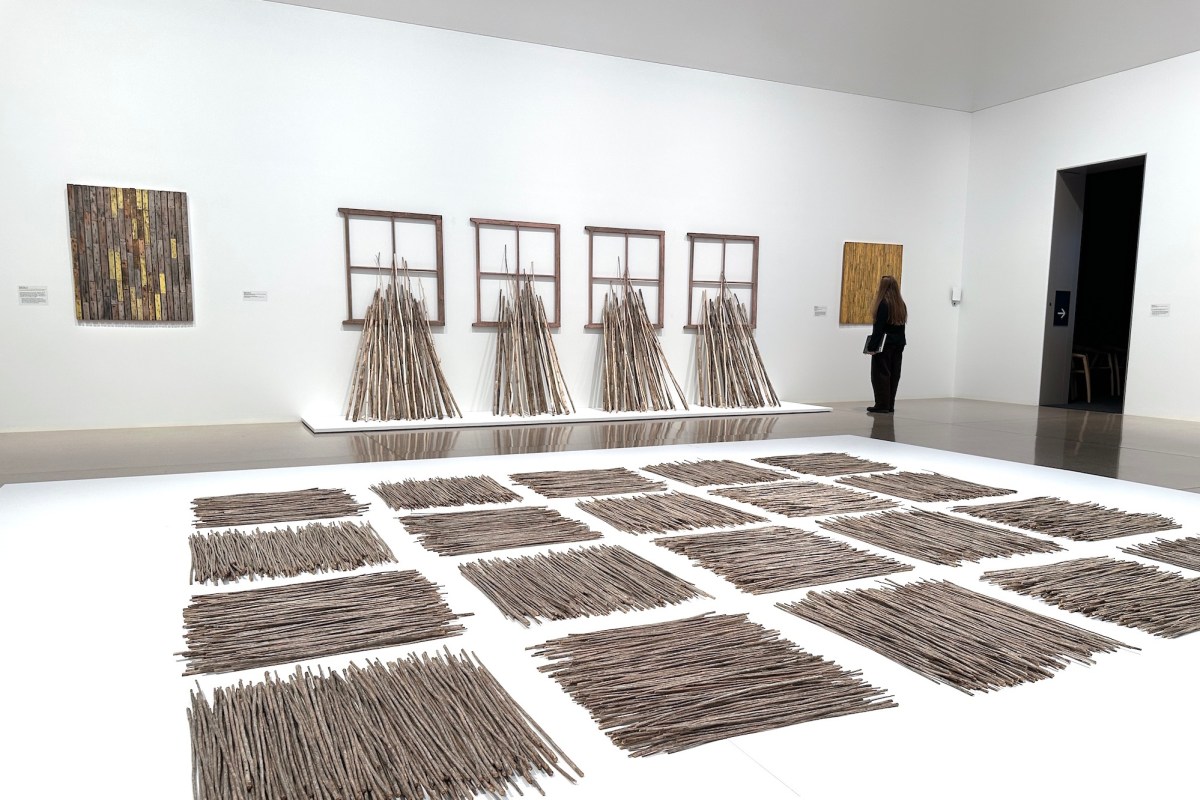 Installation view, Rosalie Gascoigne, National Gallery of Australia, featuring from front to rear, Rosalie Gascoigne, Piece to walk around, 1981; and Take over bid, 1981. Photo: Gina Fairley.
