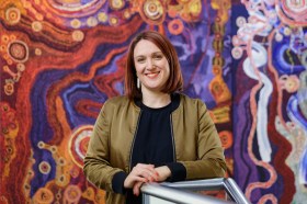 Incoming Ngununggula CEO & Director Leigh Robb with Kangkura-KangkuraKu Tjukurpa - A Sister's Story by the Ken Family Collaborative, Art Gallery of South Australia, Adelaide. Photo: Saul Steed. Courtesy: Ken Family Collaborative / Copyright Agency.